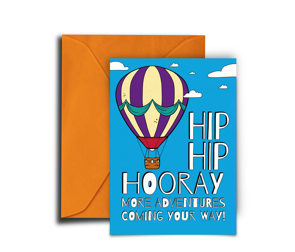 Greeting card with hot air balloon and 'Hip Hip Hooray' text on a blue background with an orange envelope.