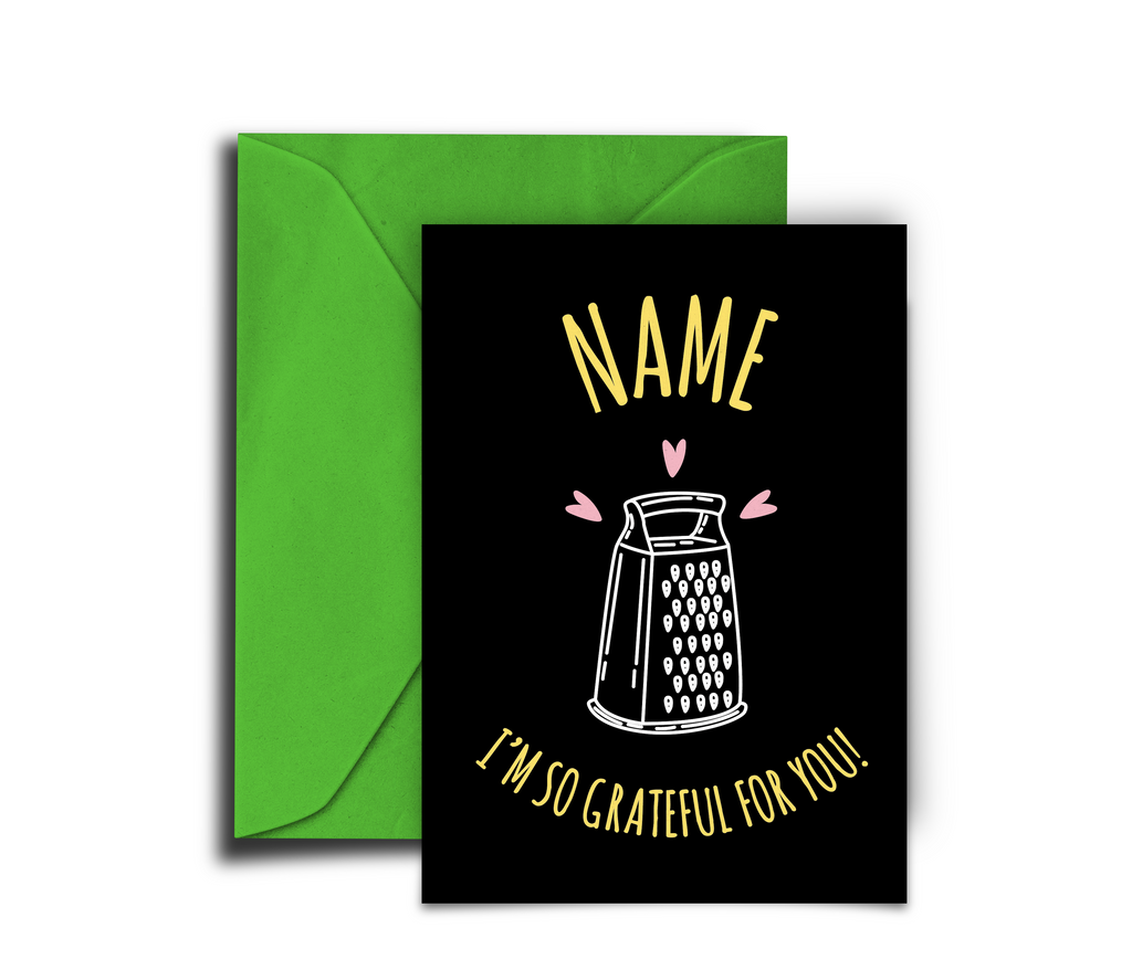 Greeting card with a grater illustration and text on a black background with a green envelope.