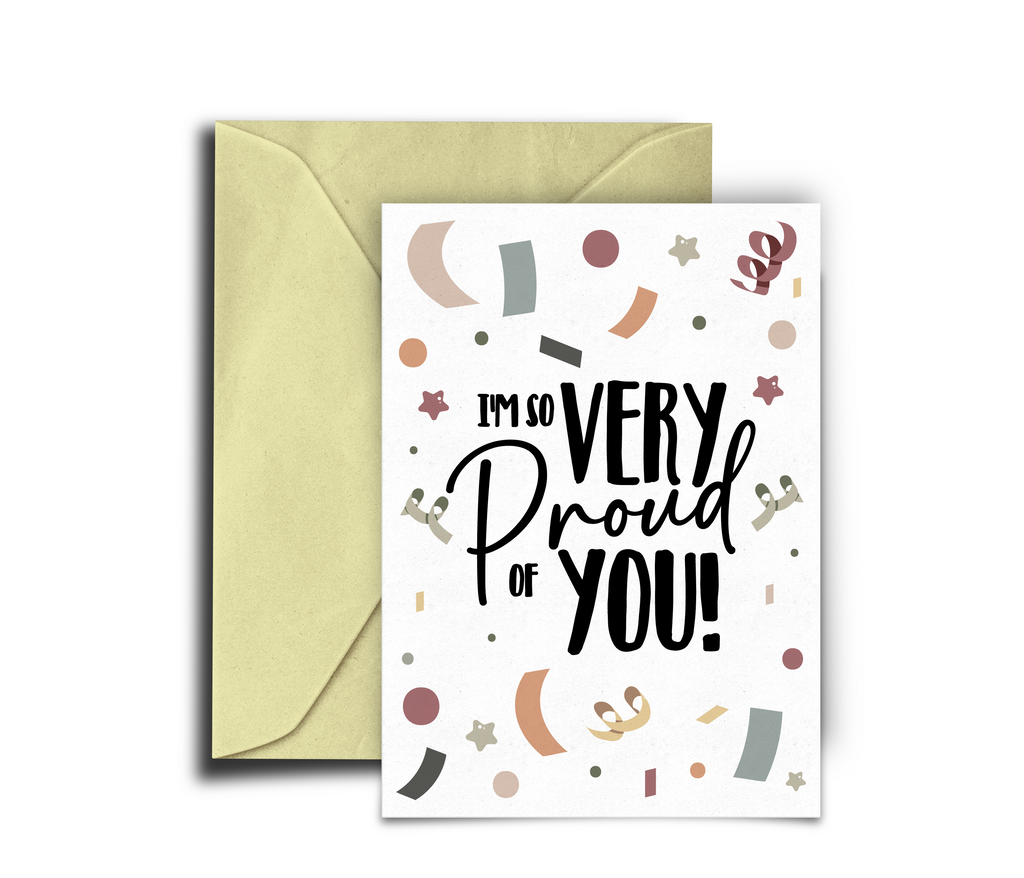 Greeting card with 'I'm so very proud of you!' text and colorful shapes, accompanied by a beige envelope.